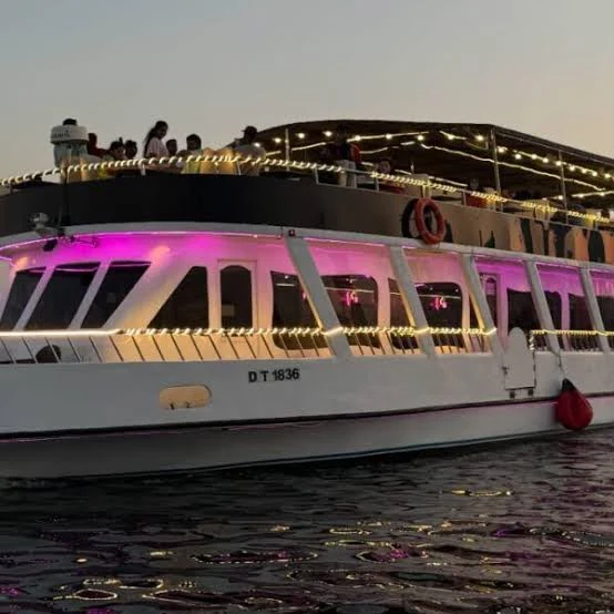 Premium dinner cruise in Dubai Marina with bright lights